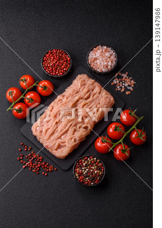 Raw fresh ground chicken, turkey, or pork for burgers or meatballs. Raw ground chicken Raw fresh ground chicken, turkey, or pork for burgers or meatballs. Raw ground chicken 139147986