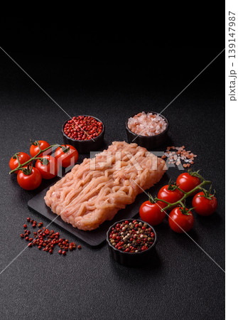 Raw fresh ground chicken, turkey, or pork for burgers or meatballs. Raw ground chicken Raw fresh ground chicken, turkey, or pork for burgers or meatballs. Raw ground chicken 139147987