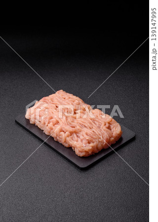 Raw fresh ground chicken, turkey, or pork for burgers or meatballs. Raw ground chicken Raw fresh ground chicken, turkey, or pork for burgers or meatballs. Raw ground chicken 139147995