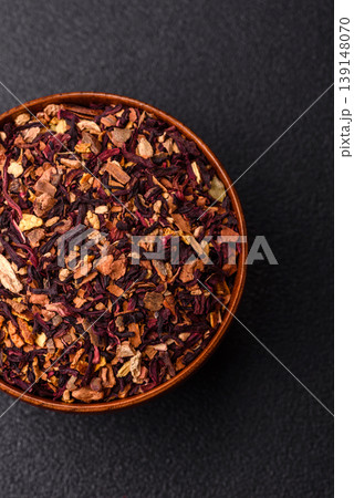 Dry herbal or fruit tea with flower petals and aromatic additives. Dry fruit herbal tea Dry herbal or fruit tea with flower petals and aromatic additives. Dry fruit herbal tea 139148070