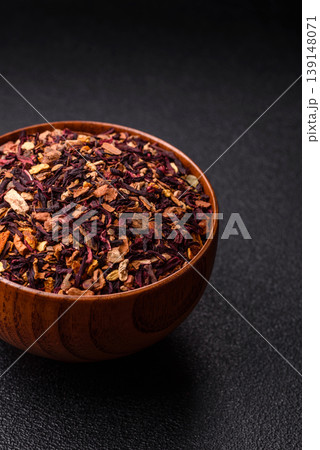 Dry herbal or fruit tea with flower petals and aromatic additives. Dry fruit herbal tea 139148071