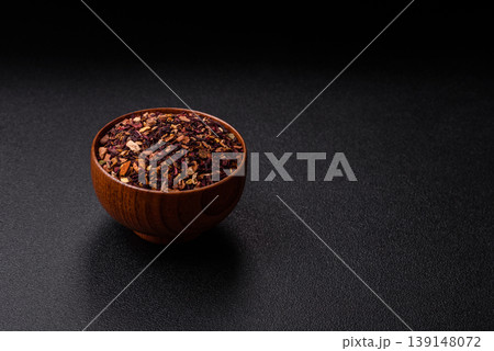 Dry herbal or fruit tea with flower petals and aromatic additives. Dry fruit herbal tea Dry herbal or fruit tea with flower petals and aromatic additives. Dry fruit herbal tea 139148072