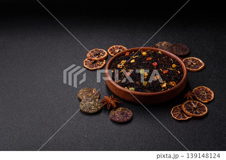Dry black tea with herbal leaves and aromatic additives. Dry fruity black tea Dry black tea with herbal leaves and aromatic additives. Dry fruity black tea 139148124
