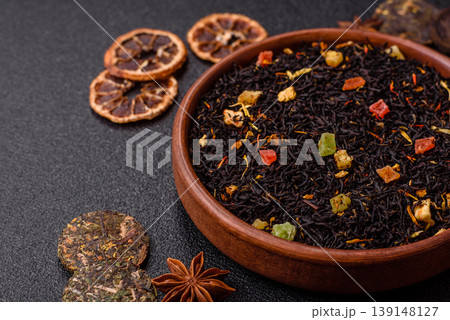 Dry black tea with herbal leaves and aromatic additives. Dry fruity black tea 139148127
