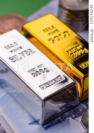 Gold and silver bullion or ingots as metals for bank storage, investments. Gold and silver bars Gold and silver bullion or ingots as metals for bank storage, investments. Gold and silver bars 139148240
