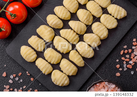 Raw homemade potato gnocchi, made with salt and spices, ready for lunch. Raw gnocchi 139148332