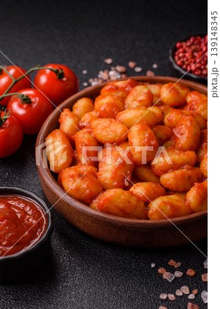 Homemade potato gnocchi with Bolognese sauce, seasoned with salt and spices. Gnocchi with sauce 139148345
