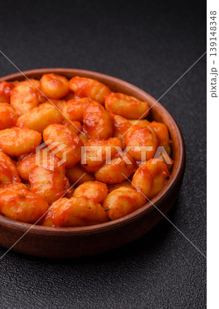 Homemade potato gnocchi with Bolognese sauce, seasoned with salt and spices. Gnocchi with sauce 139148348