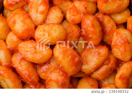 Homemade potato gnocchi with Bolognese sauce, seasoned with salt and spices. Gnocchi with sauce Homemade potato gnocchi with Bolognese sauce, seasoned with salt and spices. Gnocchi with sauce 139148352
