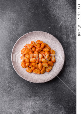 Homemade potato gnocchi with Bolognese sauce, seasoned with salt and spices. Gnocchi with sauce Homemade potato gnocchi with Bolognese sauce, seasoned with salt and spices. Gnocchi with sauce 139148354