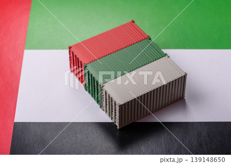 Cargo containers on the UAE flag as a conceptual backdrop for goods export. Cargo containers Cargo containers on the UAE flag as a conceptual backdrop for goods export. Cargo containers 139148650
