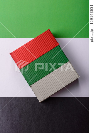 Cargo containers on the UAE flag as a conceptual backdrop for goods export. Cargo containers Cargo containers on the UAE flag as a conceptual backdrop for goods export. Cargo containers 139148651