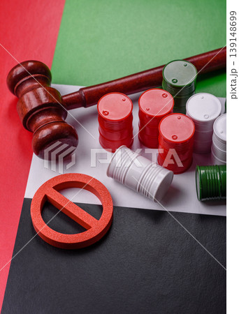 The cargo container ban on the UAE flag as a conceptual backdrop . The cargo container embargo The cargo container ban on the UAE flag as a conceptual backdrop . The cargo container embargo 139148699