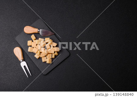Parmesan cheese cubes for pasta, salads, and other Italian dishes. Parmesan cheese Parmesan cheese cubes for pasta, salads, and other Italian dishes. Parmesan cheese 139148840