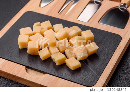 Parmesan cheese cubes for pasta, salads, and other Italian dishes. Parmesan cheese 139148845