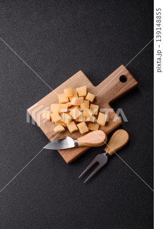Parmesan cheese cubes for pasta, salads, and other Italian dishes. Parmesan cheese Parmesan cheese cubes for pasta, salads, and other Italian dishes. Parmesan cheese 139148855