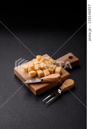 Parmesan cheese cubes for pasta, salads, and other Italian dishes. Parmesan cheese 139148857