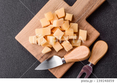 Parmesan cheese cubes for pasta, salads, and other Italian dishes. Parmesan cheese Parmesan cheese cubes for pasta, salads, and other Italian dishes. Parmesan cheese 139148859