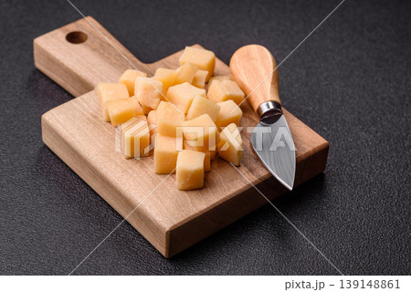 Parmesan cheese cubes for pasta, salads, and other Italian dishes. Parmesan cheese Parmesan cheese cubes for pasta, salads, and other Italian dishes. Parmesan cheese 139148861
