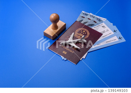 China, Chinese passport with money and flight tickets. Chinese passport China, Chinese passport with money and flight tickets. Chinese passport 139149103