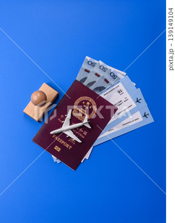 China, Chinese passport with money and flight tickets. Chinese passport China, Chinese passport with money and flight tickets. Chinese passport 139149104