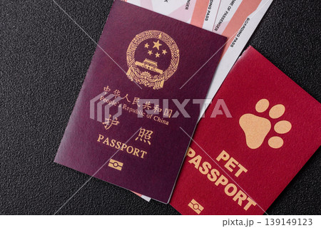 China, Chinese passport with money and flight tickets. Chinese passport 139149123