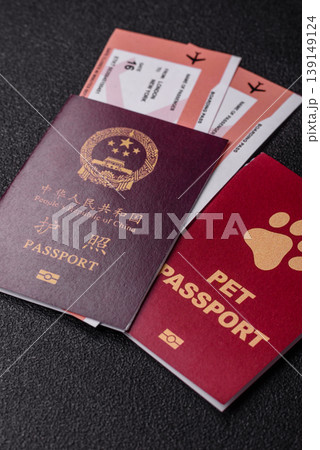 China, Chinese passport with money and flight tickets. Chinese passport China, Chinese passport with money and flight tickets. Chinese passport 139149124