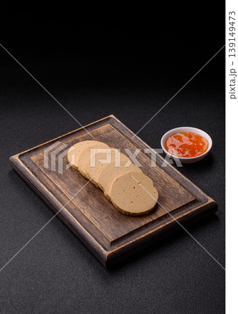 Foie gras, sliced chicken liver with fruit jam for French toast. Foie gras Foie gras, sliced chicken liver with fruit jam for French toast. Foie gras 139149473