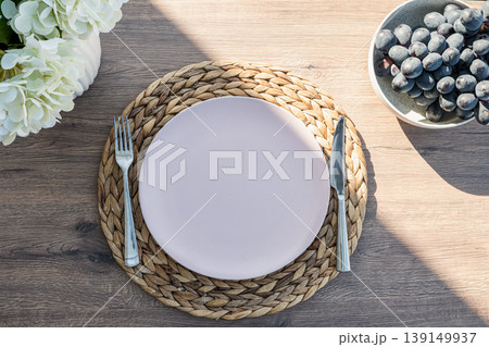 Table Setting With Plate Cutlery And Grapes Top View Table Setting With Plate Cutlery And Grapes Top View 139149937