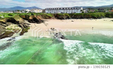 Experience the breathtaking beauty of a serene coastal beach with clear waters for relaxation Experience the breathtaking beauty of a serene coastal beach with clear waters for relaxation 139150125