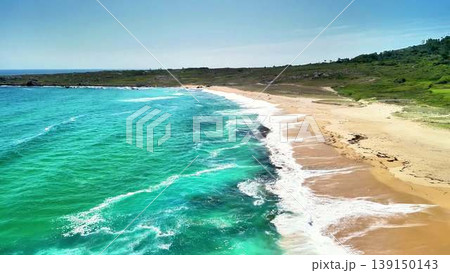 A Beautiful and Scenic View of a Tranquil Beach with Beautiful Turquoise Waters Awaiting A Beautiful and Scenic View of a Tranquil Beach with Beautiful Turquoise Waters Awaiting 139150143