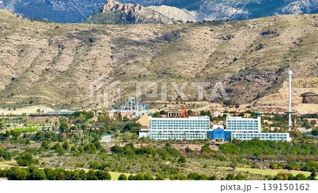 Experience the Stunning and Breathtaking View of the Amusement Park Surrounded by Majestic Mountains Experience the Stunning and Breathtaking View of the Amusement Park Surrounded by Majestic Mountains 139150162