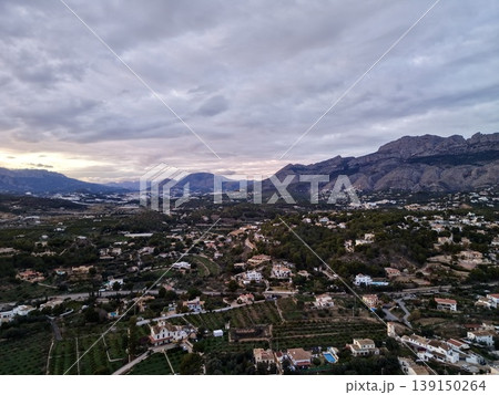 Farmland with vineyards and terraces, Agricultural terrain showing vineyards and mountain slopes Farmland with vineyards and terraces, Agricultural terrain showing vineyards and mountain slopes 139150264