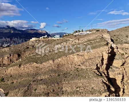 Coastal views with sky and sea, Vibrant coastal landscape featuring rugged cliffs and azure waters Coastal views with sky and sea, Vibrant coastal landscape featuring rugged cliffs and azure waters 139150333