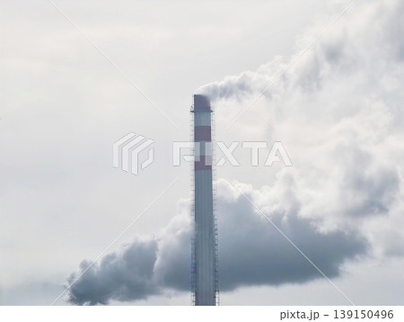 Industrial pollution concerns. Environmental debate over emissions from industrial manufacturing plants Industrial pollution concerns. Environmental debate over emissions from industrial manufacturing plants 139150496
