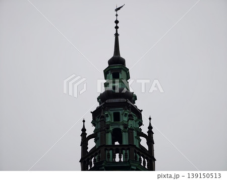 Majestic historic tower with verdigris copper embellishments and dramatic vertical perspective Majestic historic tower with verdigris copper embellishments and dramatic vertical perspective 139150513