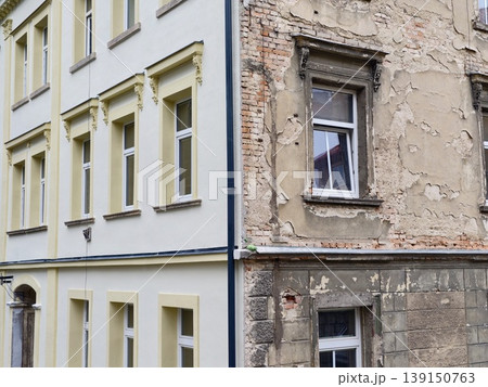 Visually documenting building transformation process. Portal showing before and after restoration stages Visually documenting building transformation process. Portal showing before and after restoration stages 139150763