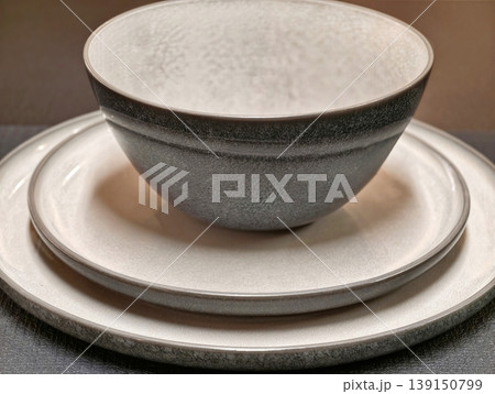 Artisan crafted stoneware with matte glaze and speckled neutral gray tones for elegant dining Artisan crafted stoneware with matte glaze and speckled neutral gray tones for elegant dining 139150799