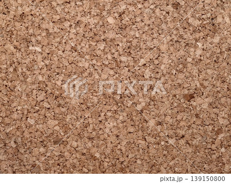 Sustainable earth toned cork surface with textured granules ideal for interior projects and crafts 139150800