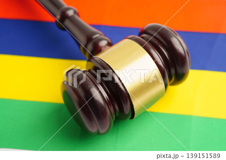 Mauritius flag with black stethoscope, Business and finance concept. Mauritius flag with black stethoscope, Business and finance concept. 139151589