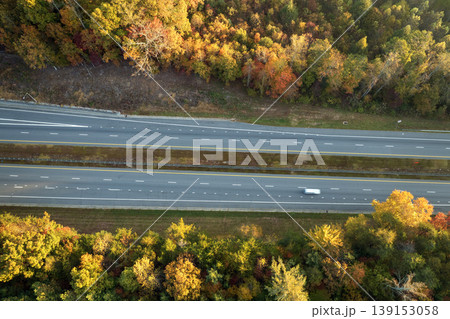 Wide multilane highway road in USA Appalachian mountains with fast driving cars. Above view of American transportation infrastructure 139153058