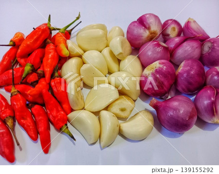 photo of garlic, shallots and hot red chilies photo of garlic, shallots and hot red chilies 139155292