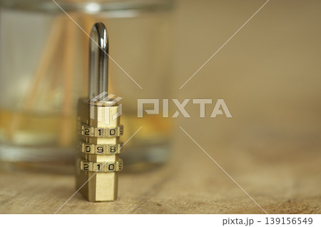 Brass combination padlock with numeric code for security and data protection Brass combination padlock with numeric code for security and data protection 139156549