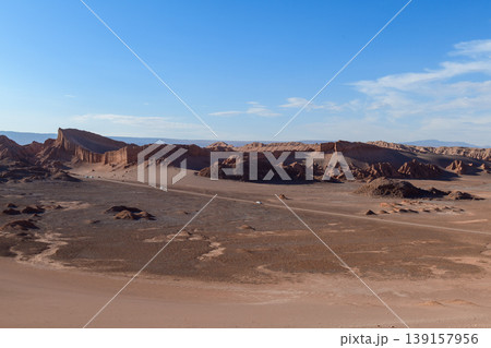 Majestic Valle de la Luna desert landscape in Atacama with rock formation and blue sky Majestic Valle de la Luna desert landscape in Atacama with rock formation and blue sky 139157956