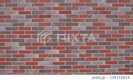 Brickwork made of multicolored bricks with smooth seams and empty space on the textured surface, a wall of gray, red and brown bricks, an interior fragment for background use Brickwork made of multicolored bricks with smooth seams and empty space on the textured surface, a wall of gray, red and brown bricks, an interior fragment for background use 139158814