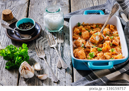 Indian fish curry with cauliflower and green peas Indian fish curry with cauliflower and green peas 139159757