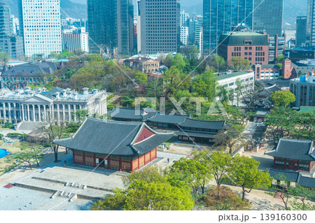 Seoul, South Korea - Apr. 12 , 2026 : Aerial view of Deoksugung Palace with modern skyscrapers in Seoul, South Korea Seoul, South Korea - Apr. 12 , 2026 : Aerial view of Deoksugung Palace with modern skyscrapers in Seoul, South Korea 139160300