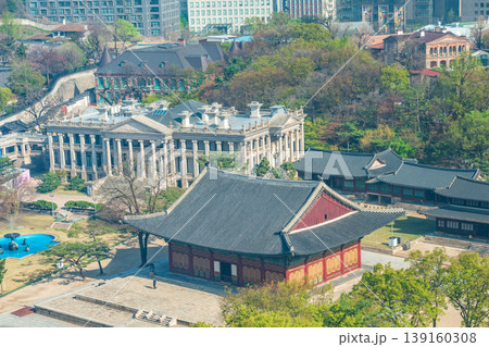 Seoul, South Korea - Apr. 12 , 2026 : Aerial view of Deoksugung Palace with modern skyscrapers in Seoul, South Korea Seoul, South Korea - Apr. 12 , 2026 : Aerial view of Deoksugung Palace with modern skyscrapers in Seoul, South Korea 139160308
