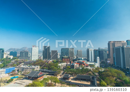 Seoul, South Korea - Apr. 12 , 2026 : Aerial view of Deoksugung Palace with modern skyscrapers in Seoul, South Korea Seoul, South Korea - Apr. 12 , 2026 : Aerial view of Deoksugung Palace with modern skyscrapers in Seoul, South Korea 139160310