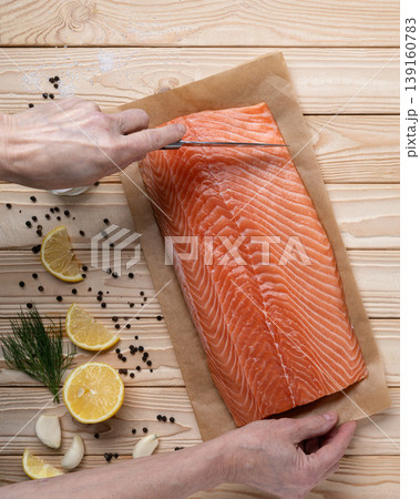 Slicing salmon fillet knife cooking process Slicing salmon fillet knife cooking process 139160783